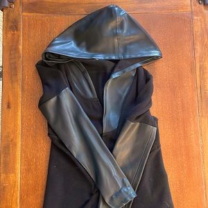 Long black sweater with leather sleeves and hood